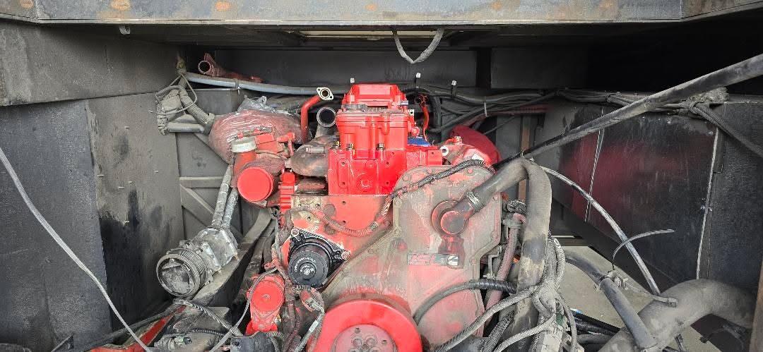 Red diesel engine close-up during rebuild